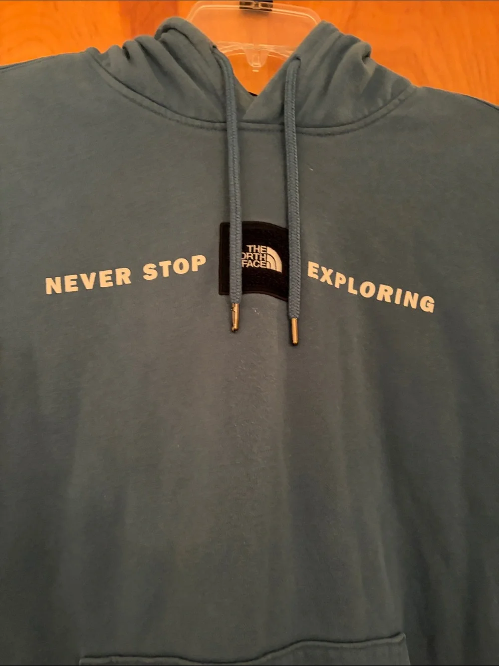 The North Face Men's Teal Blue 'Never Stop Exploring' Hooded Pullover